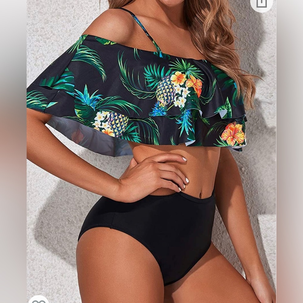 Swim suit. Never worn still with tag and lining on private area